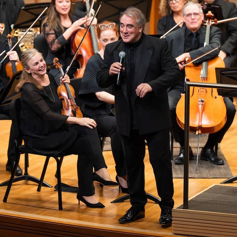LACO Music Director Jaime Martin addresses the audience as Concertmaster Margaret Batjer looks on. Photo by Elizabeth Asher/LACO.