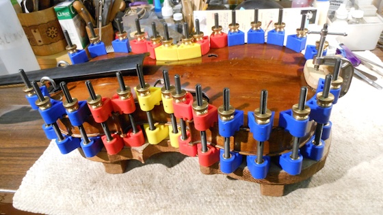 violin in clamps
