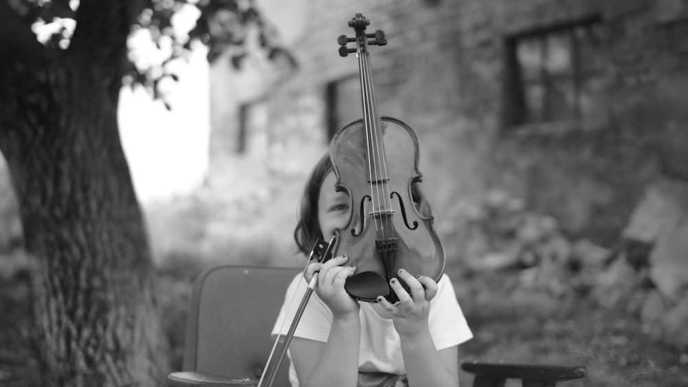 playful child violin